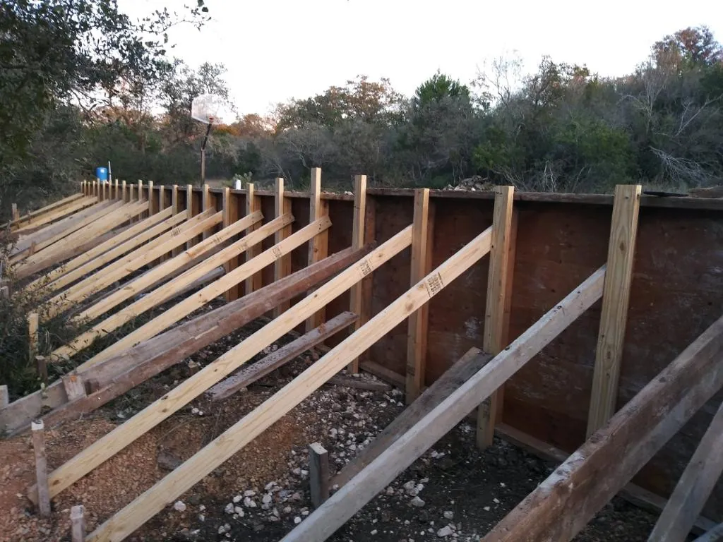 Formwork braced for a poured concrete retaining wall